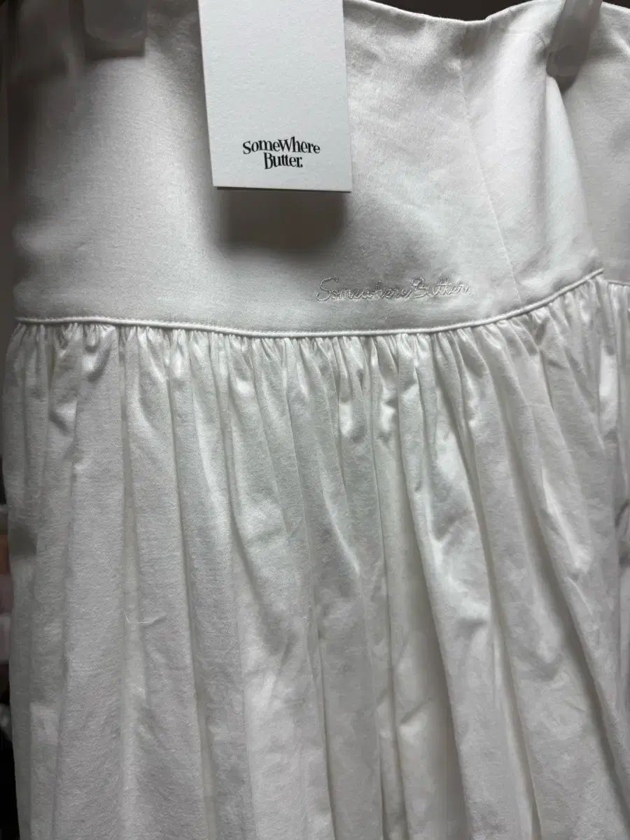 サムウェアバタフライ ボタンシャーリングロングスカート