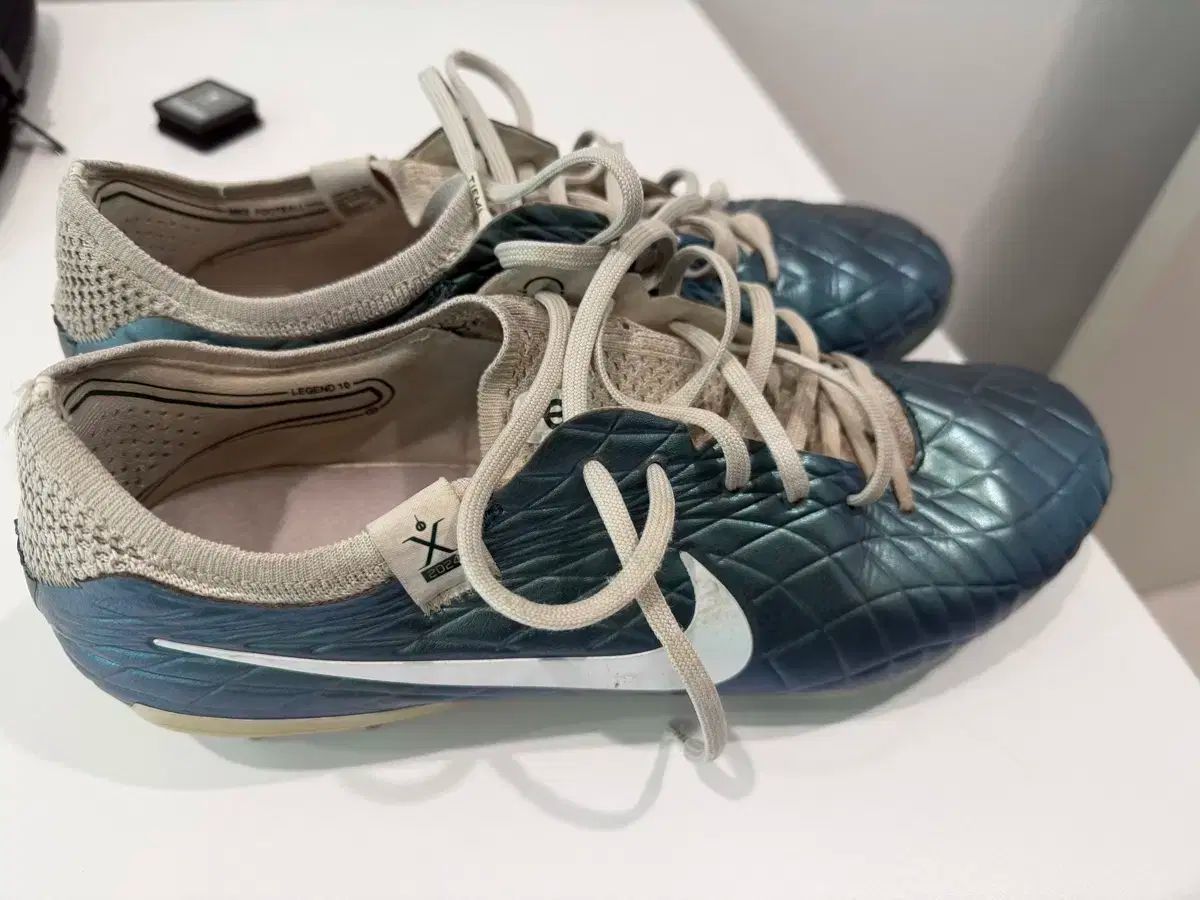 ナイキ ティエンポ エリート 275