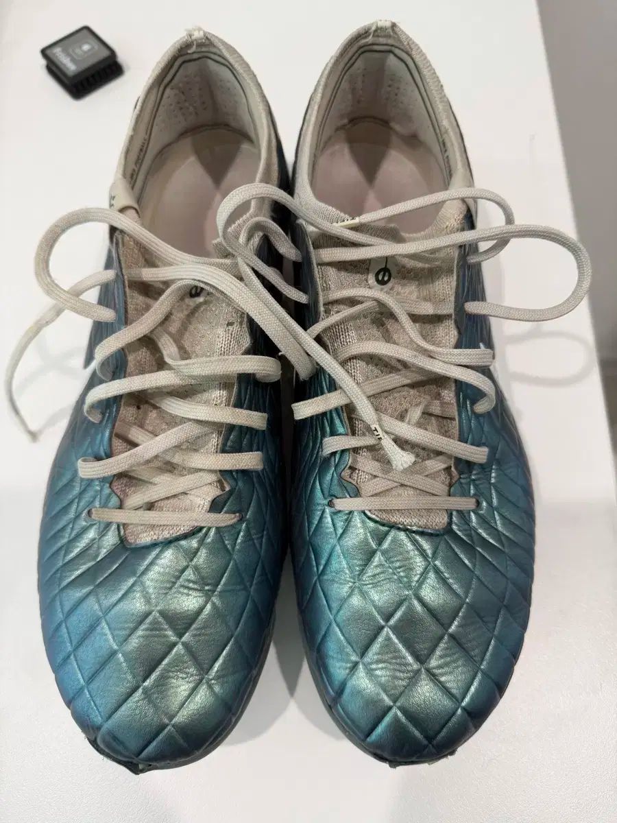 ナイキ ティエンポ エリート 275