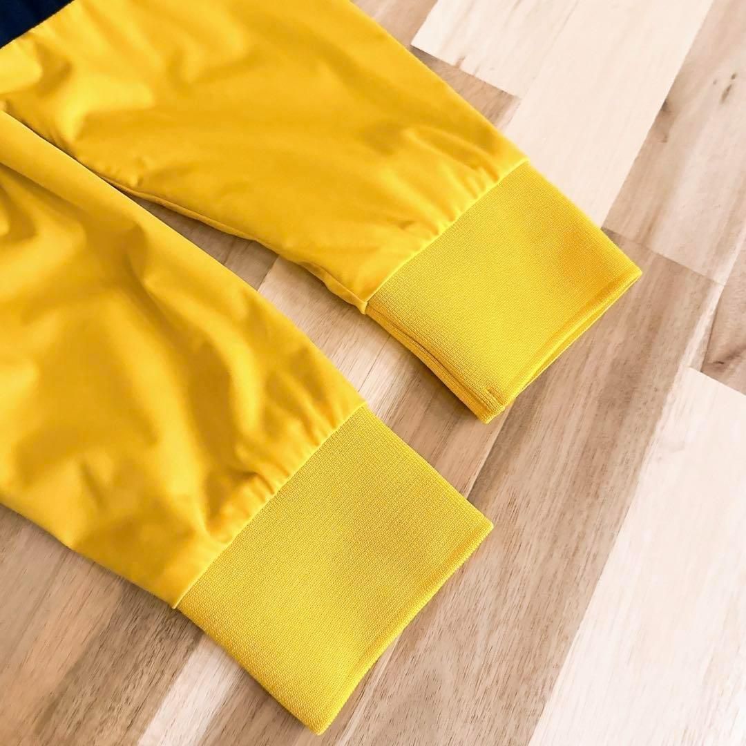 【テーラーメイド】ボーダー ロゴ 長袖ブルゾン 撥水ストレッチ ゴルフ S黄×紺 テーラーメイド】ボーダー ロゴ 長袖ブルゾン 撥水ストレッチ ゴルフ S