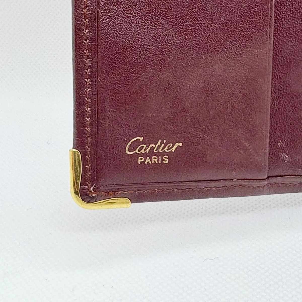 カルティエ マストライン 2つ折り 財布 レザー ボルドー【Cartier