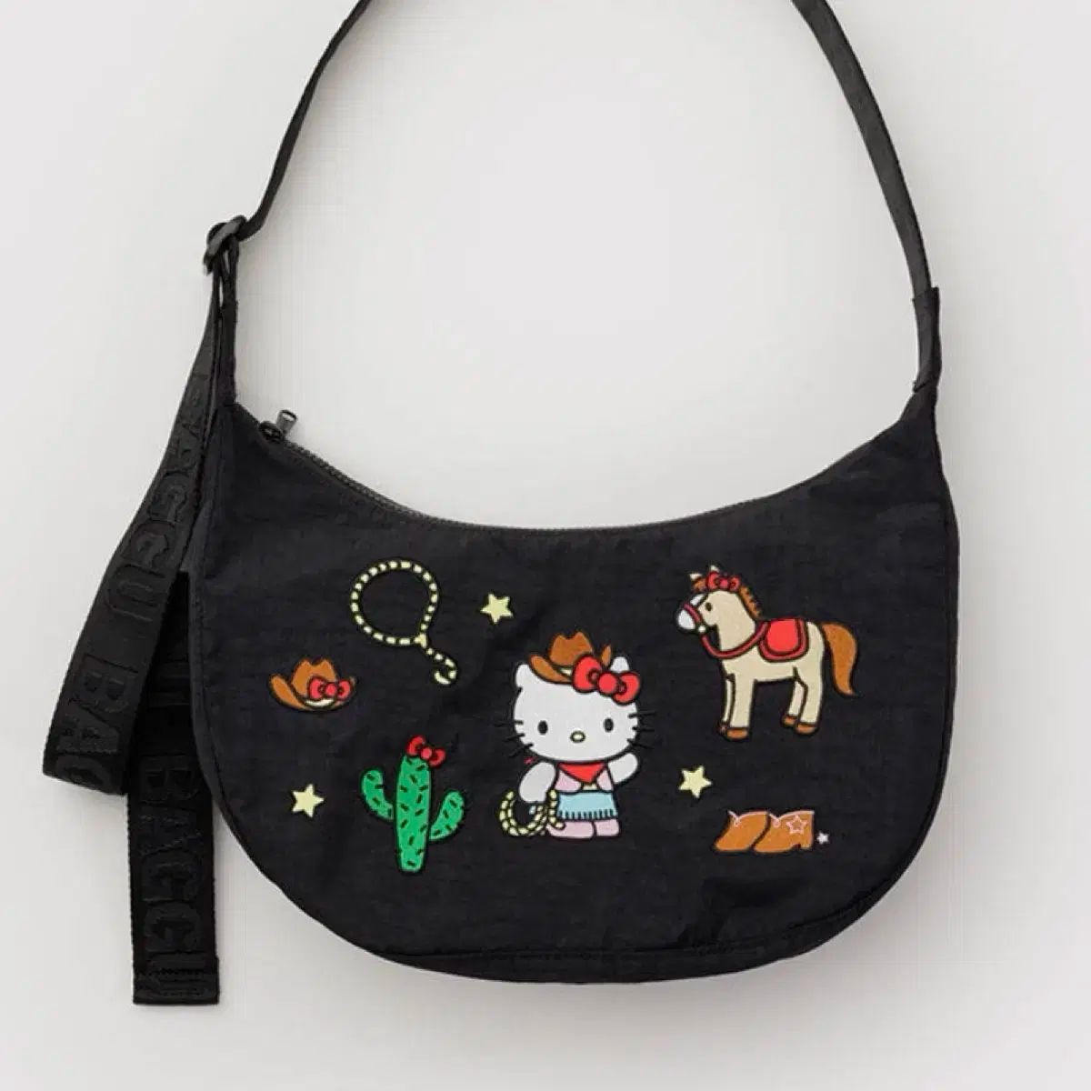 バク Mサイズ ナイロン クレセントバッグ ハローキティ ウェスタン