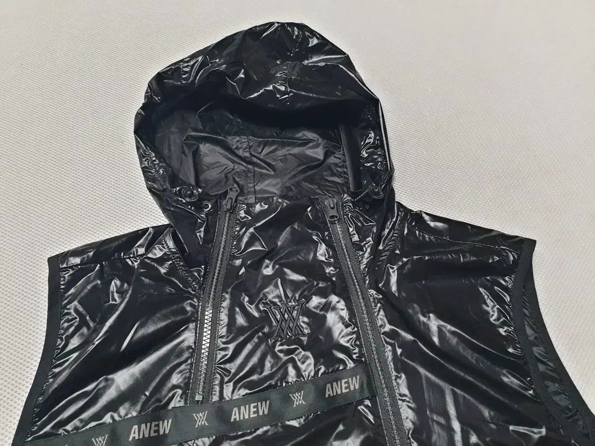A ブラック ウィンドブレーカー ベスト フード レディース