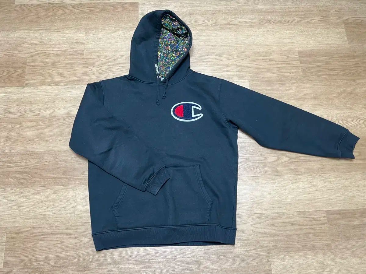 シュプリーム チャンピオン ベイズリー WHO フード XL