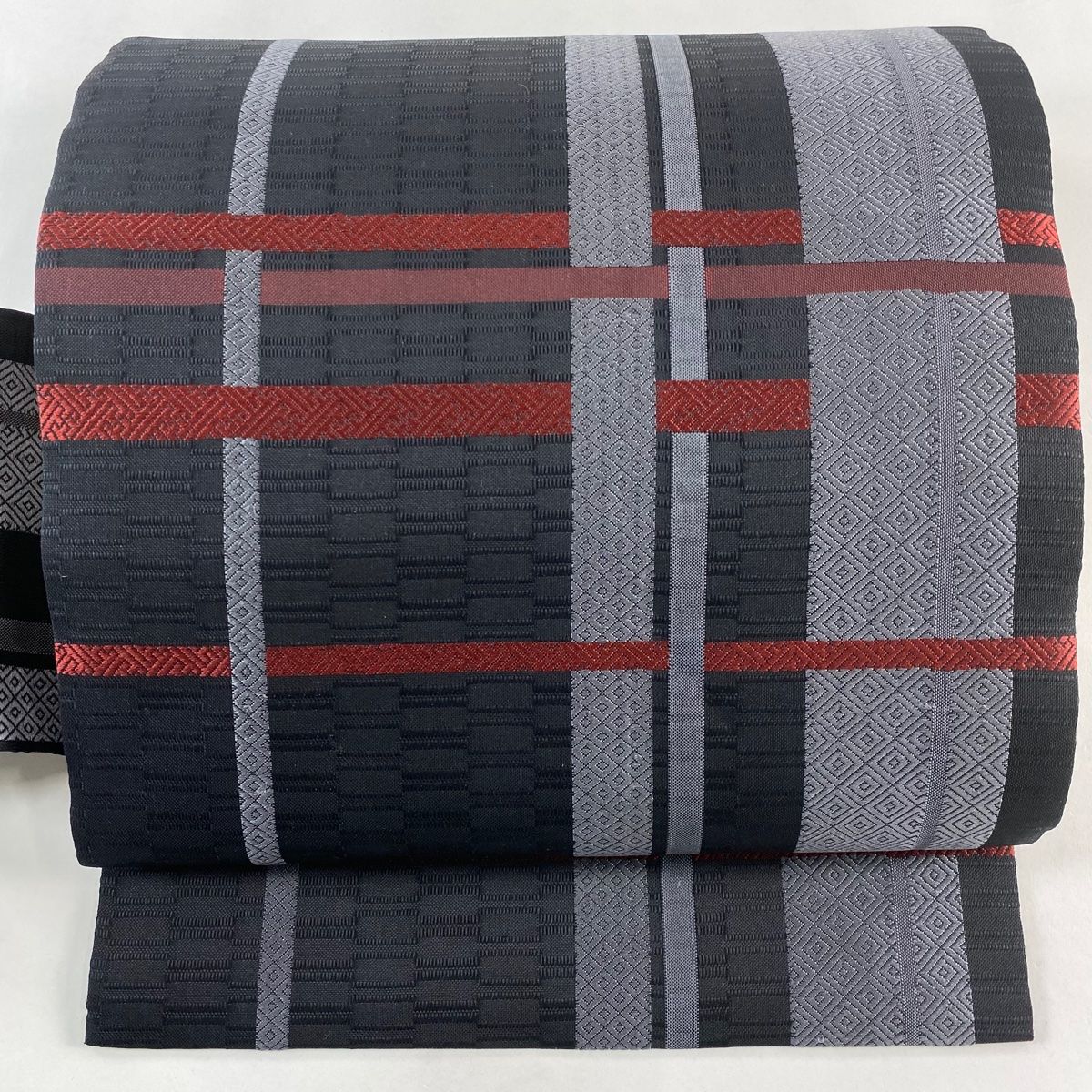 名古屋帯 秀品 入子菱 紗綾形 墨色 正絹