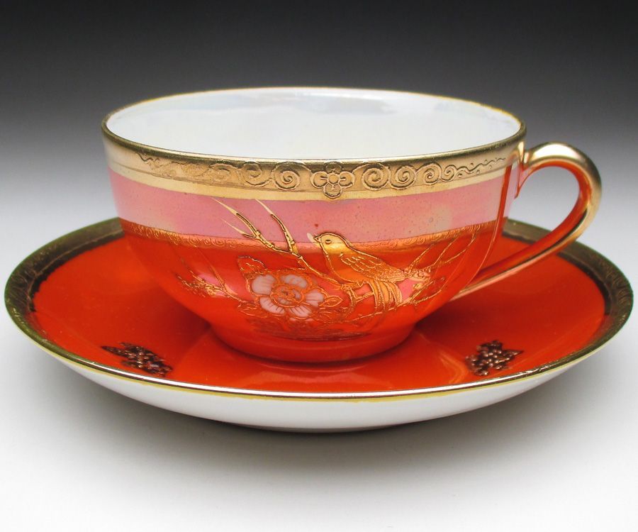 オレンジ色地金盛り