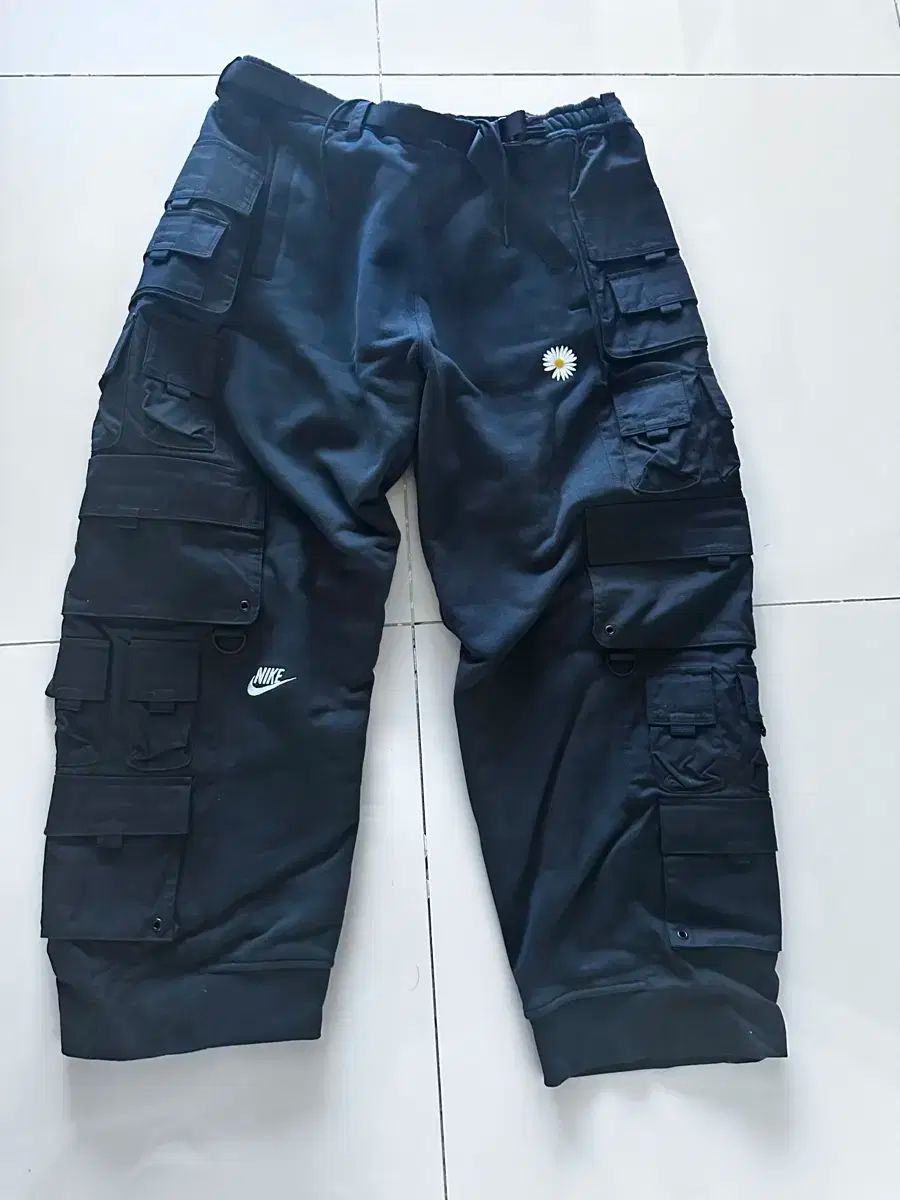 ナイキ ピースマイナスワン ブラックパンツ
