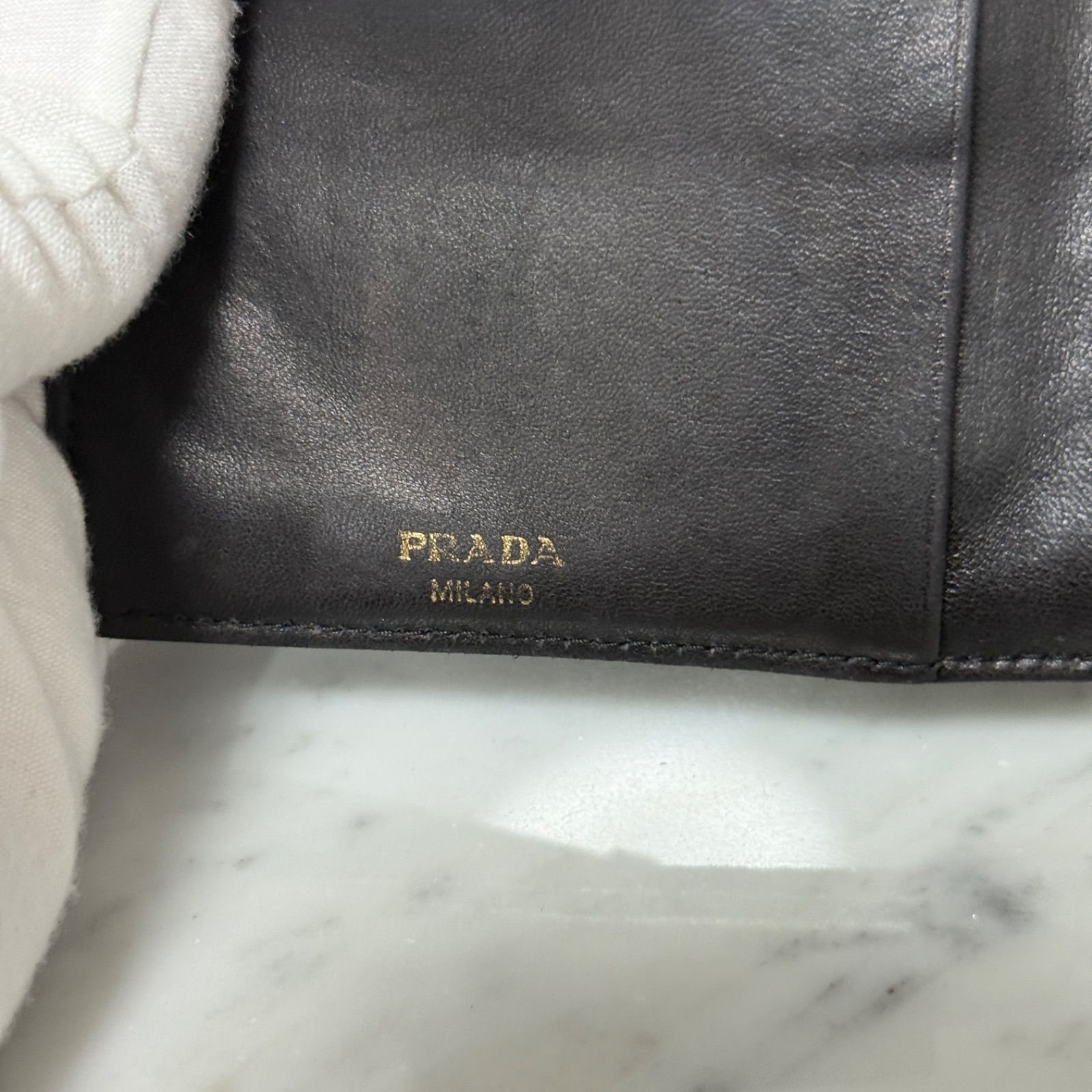 PRADA プラダ 二つ折り財布 ブラック 黒 キルティング マトラッセ トライアングル 二つ折り財布 折り財布