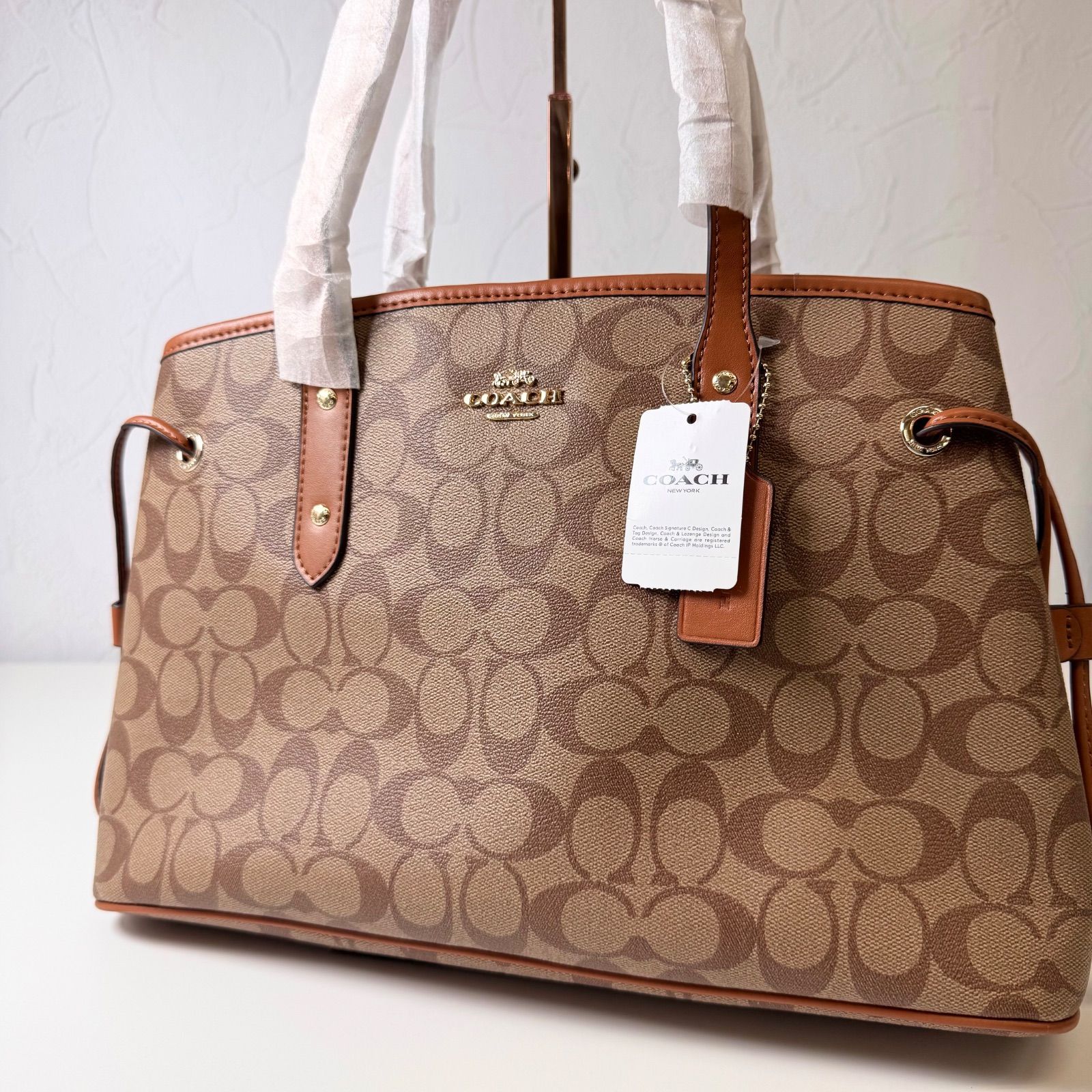 NEWランク COACH トートバッグ bag シグネチャー ドローストリング キャリーオール PVC レザー ブラウン 57842 4EL