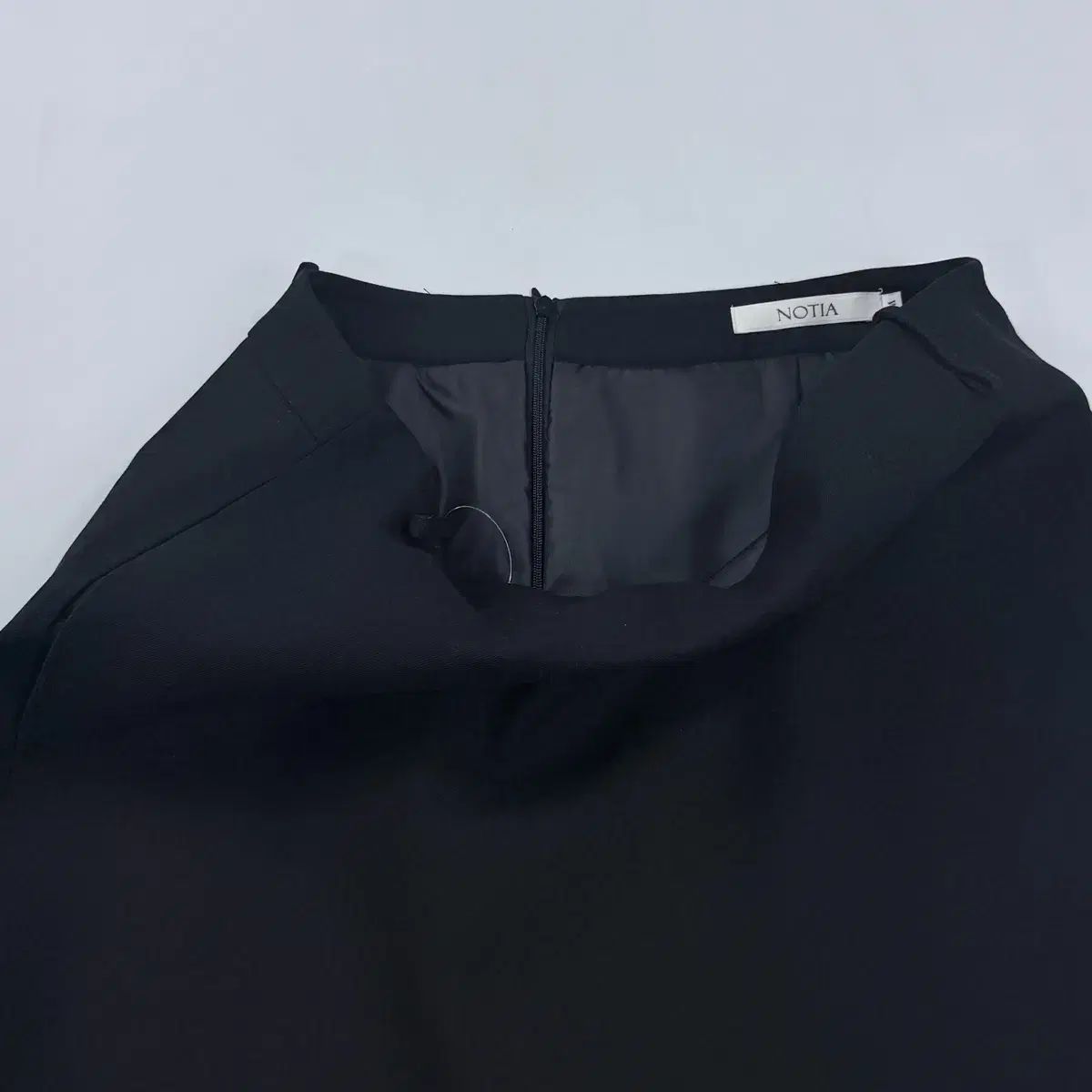 品質保証！ NOTIA ノティア フィット ロング丈スカート ブラック M 気軽な