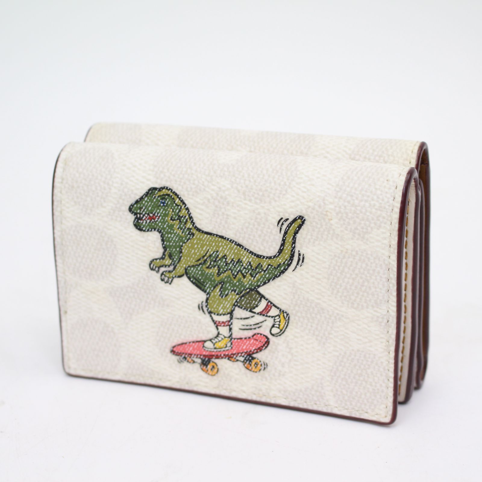 690)コーチ COACH × レキシー 恐竜 三つ折り財布 コラボ コーチ