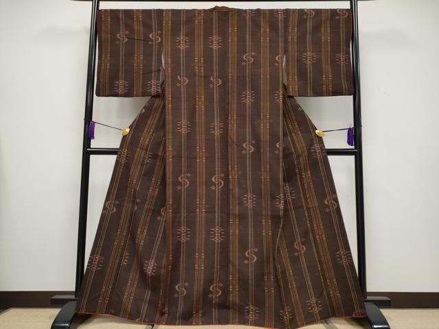 平和屋着物□極上 国指定重要無形文化財 本場久米島紬 手織 絣文様