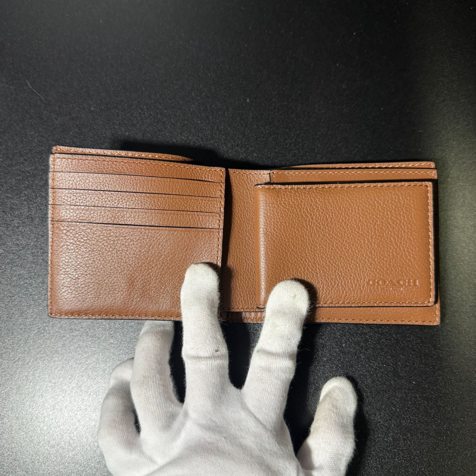 コーチ 二つ折り財布