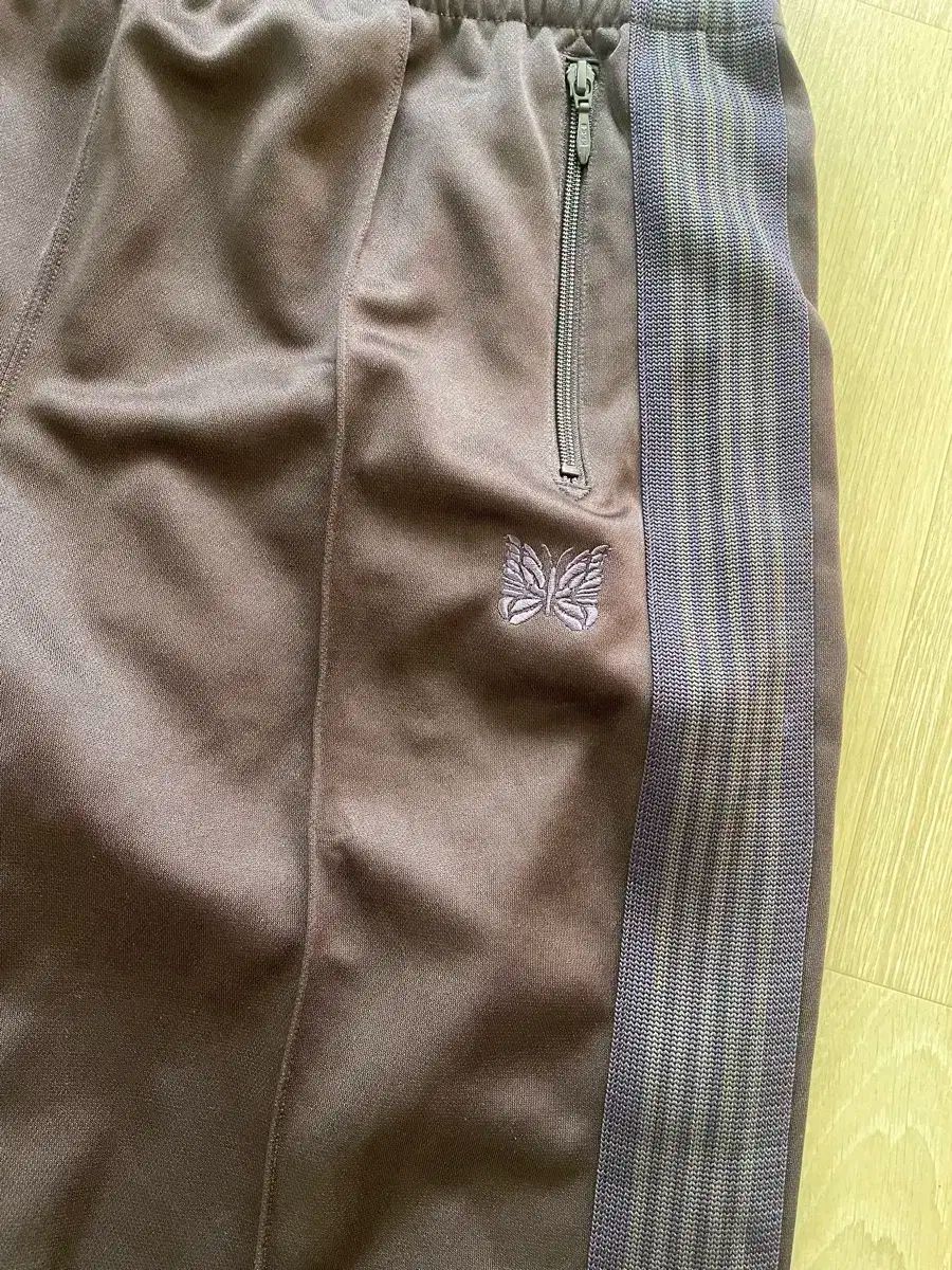 ニードルズ トラックパンツ ダークブラウン パープル