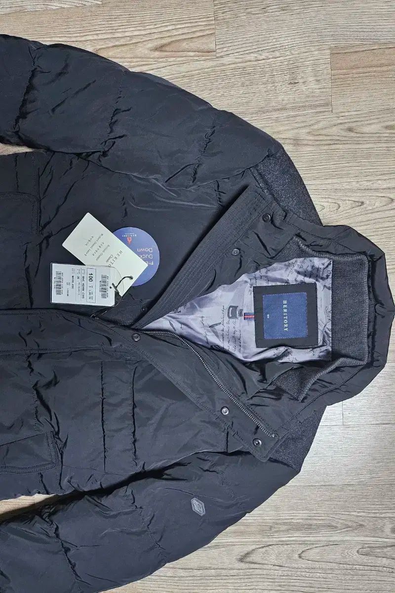 ウェルメイド ヘリトリ ダウンジャケット です