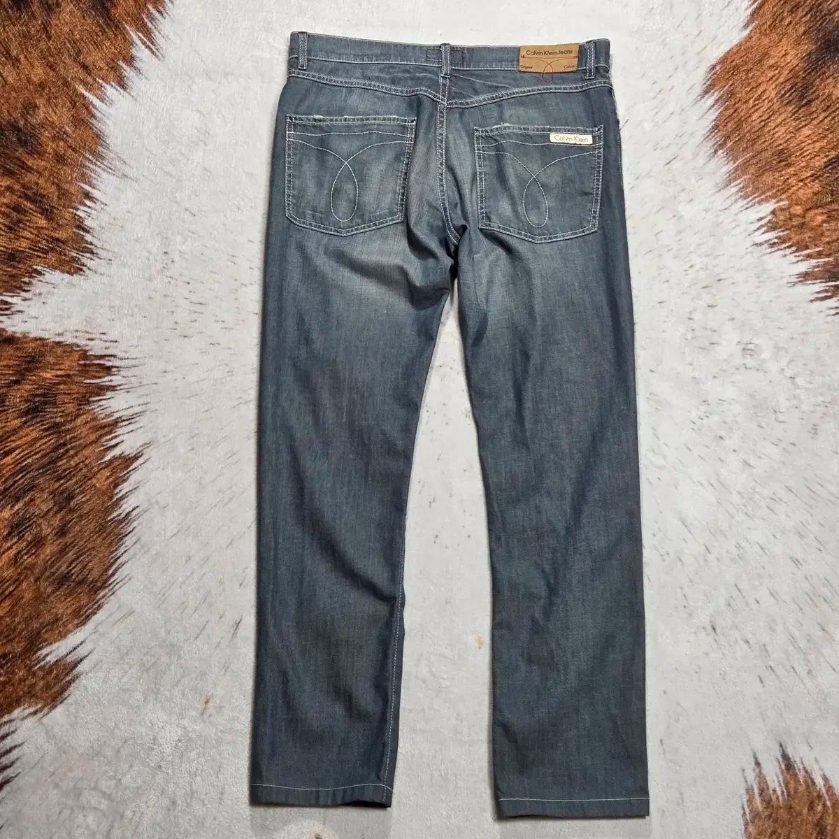 Calvin Klein ウォッシュド ブルー デニムパンツ Calvin Klein デニム 