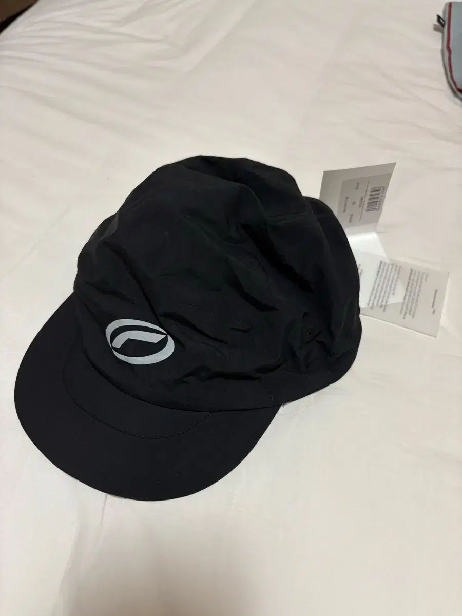 オプティミスティック ランナーズ 帽子 ブラック M