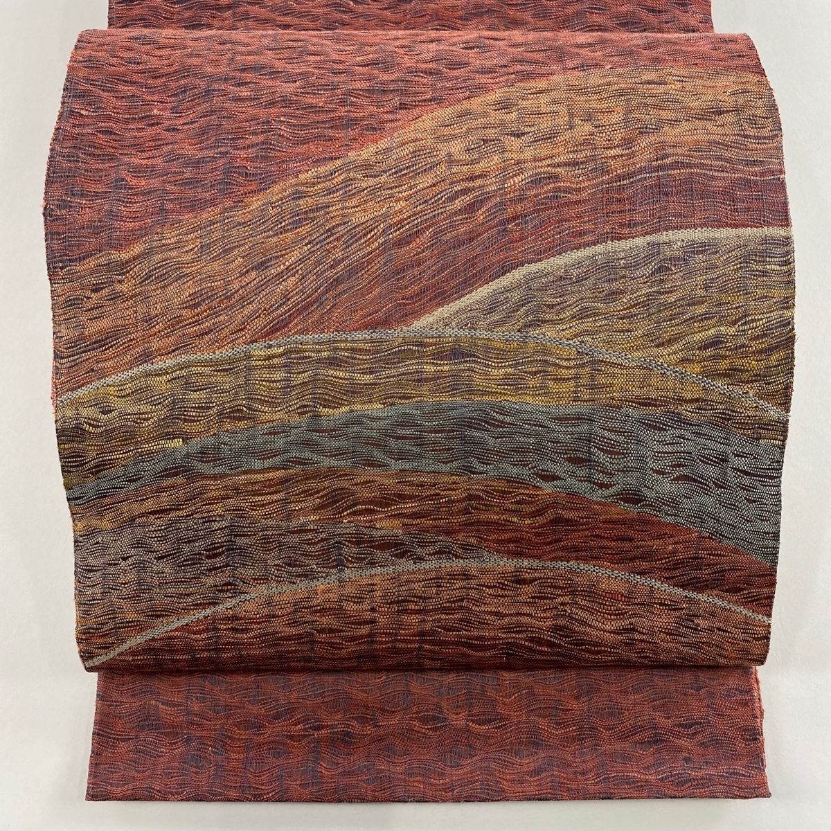 袋帯 秀品 波 幾何学模様 茜色 お太鼓柄 正絹