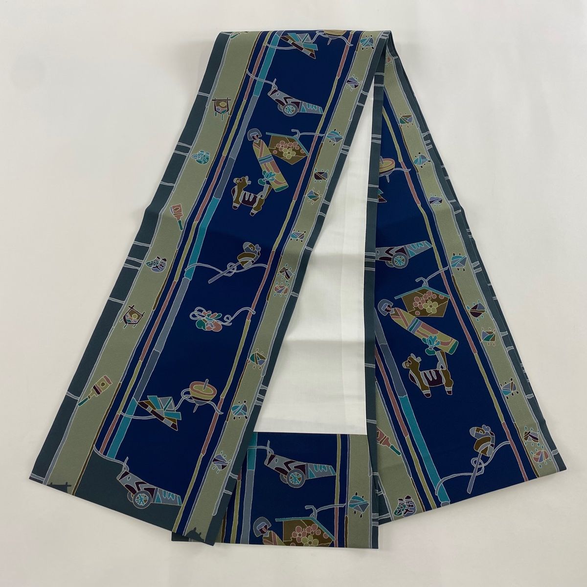  開き名古屋帯 秀品 独楽 巾着 金彩 紺色 正絹 名古屋帯 帯