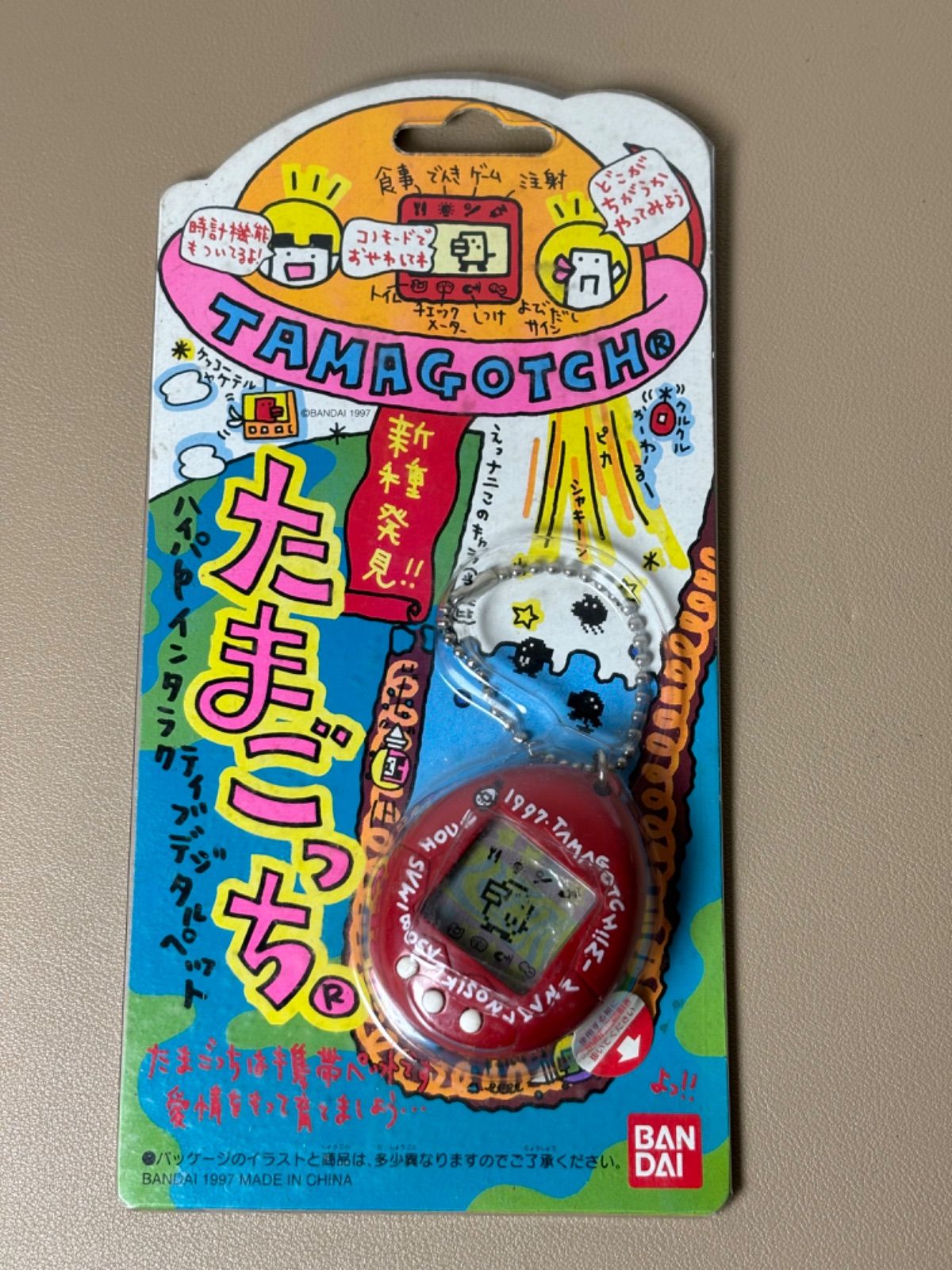 激レア・新品未使用】初代 たまごっち レッド - メルカリ