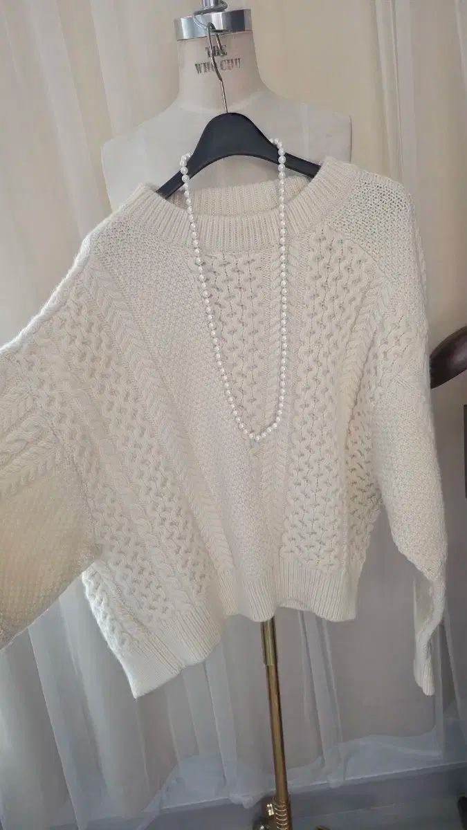 ケーブル編み ニット