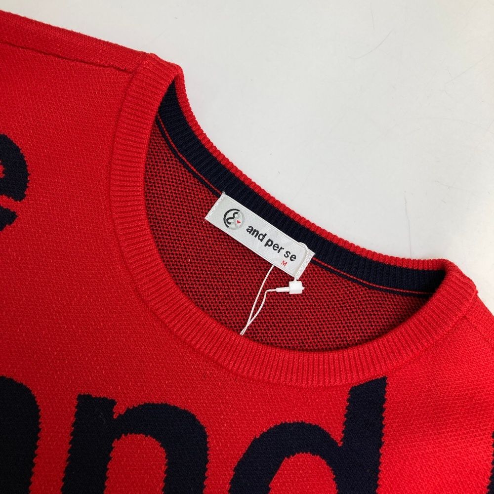  サイズ M AND PER SE アンパスィ モデル 長袖ニットセーター ロゴ総柄 レッド系 ゴルフウェア レディース ストスト セーター トレーナー レディースウェア