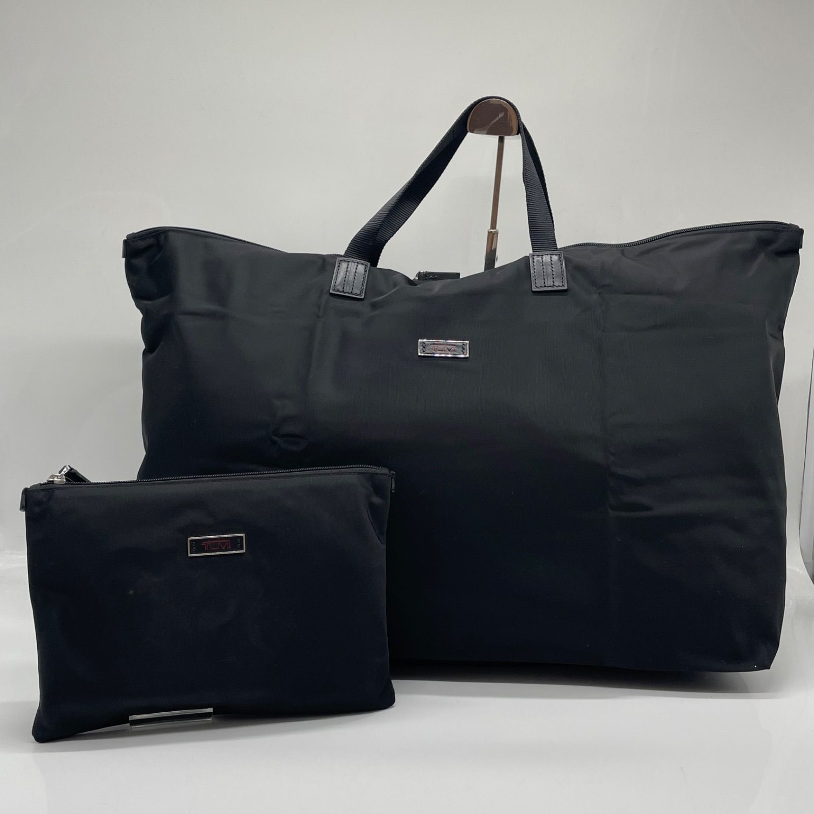 BN6765 TUMI トートバッグ ボストンバッグ 折りたたみ ジャストインケース ポーチ付き ブラック パッカブル