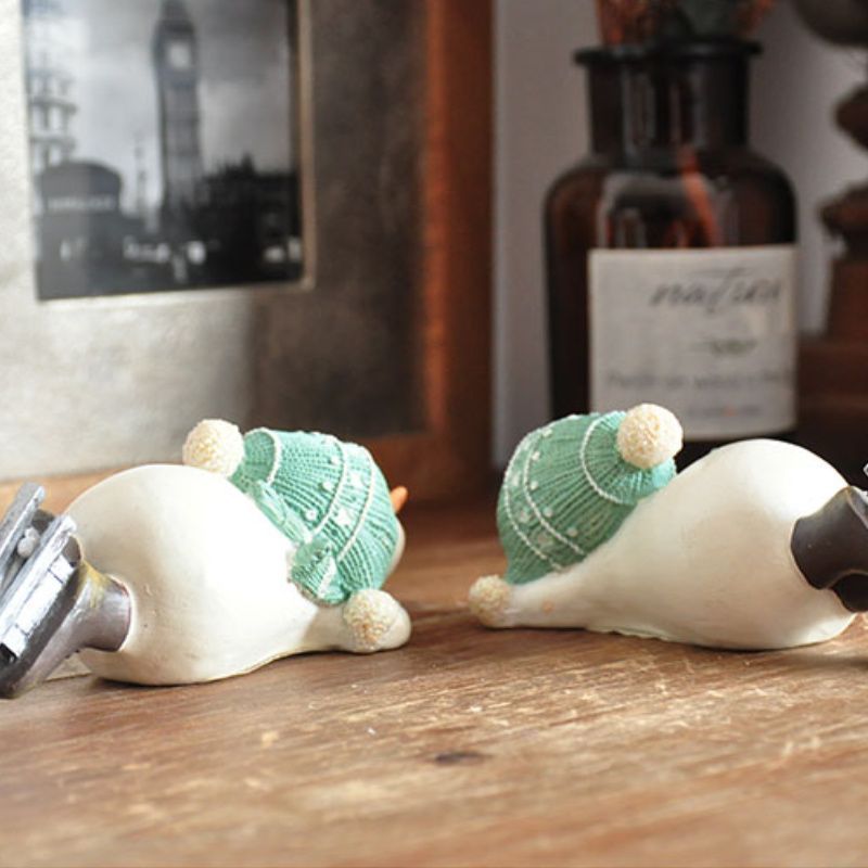 置物 オブジェ ガーデンオーナメント 寝そべっている雪だるま