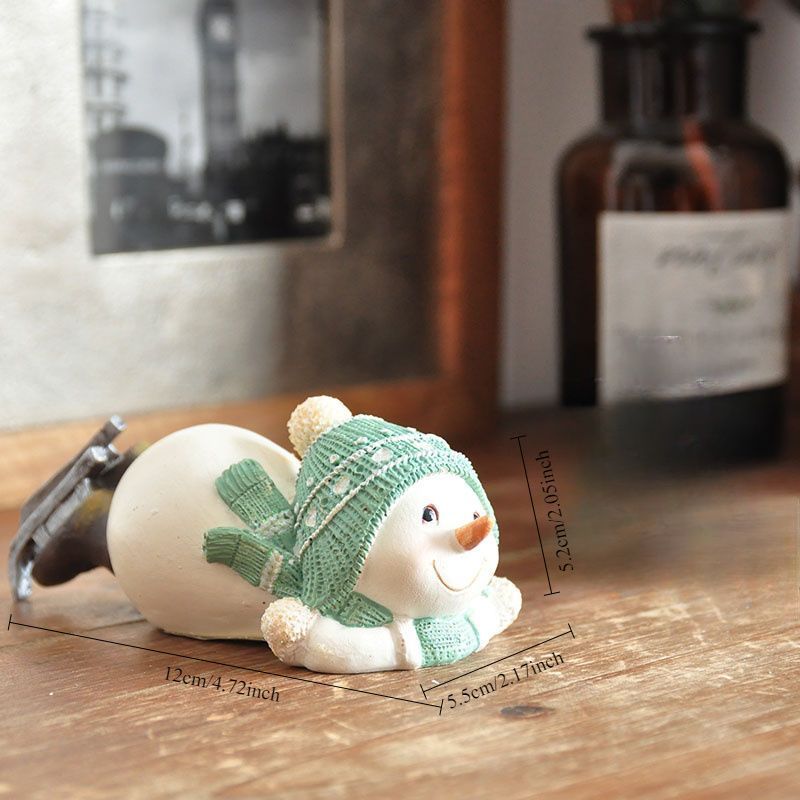 置物 オブジェ ガーデンオーナメント 寝そべっている雪だるま