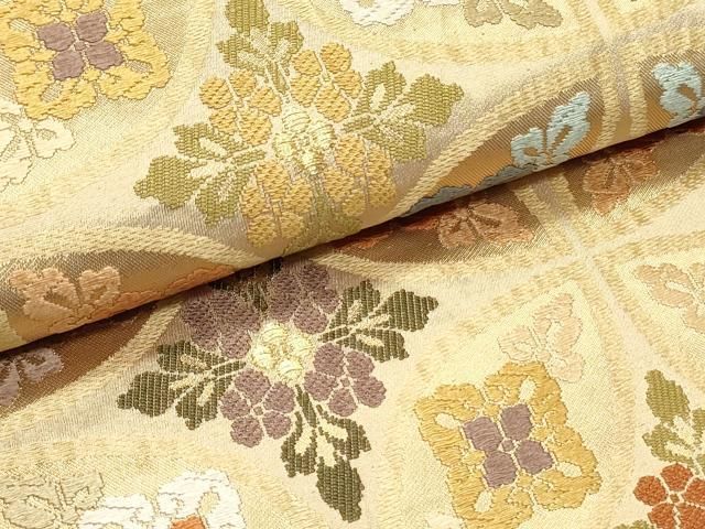 六通柄袋帯 唐織