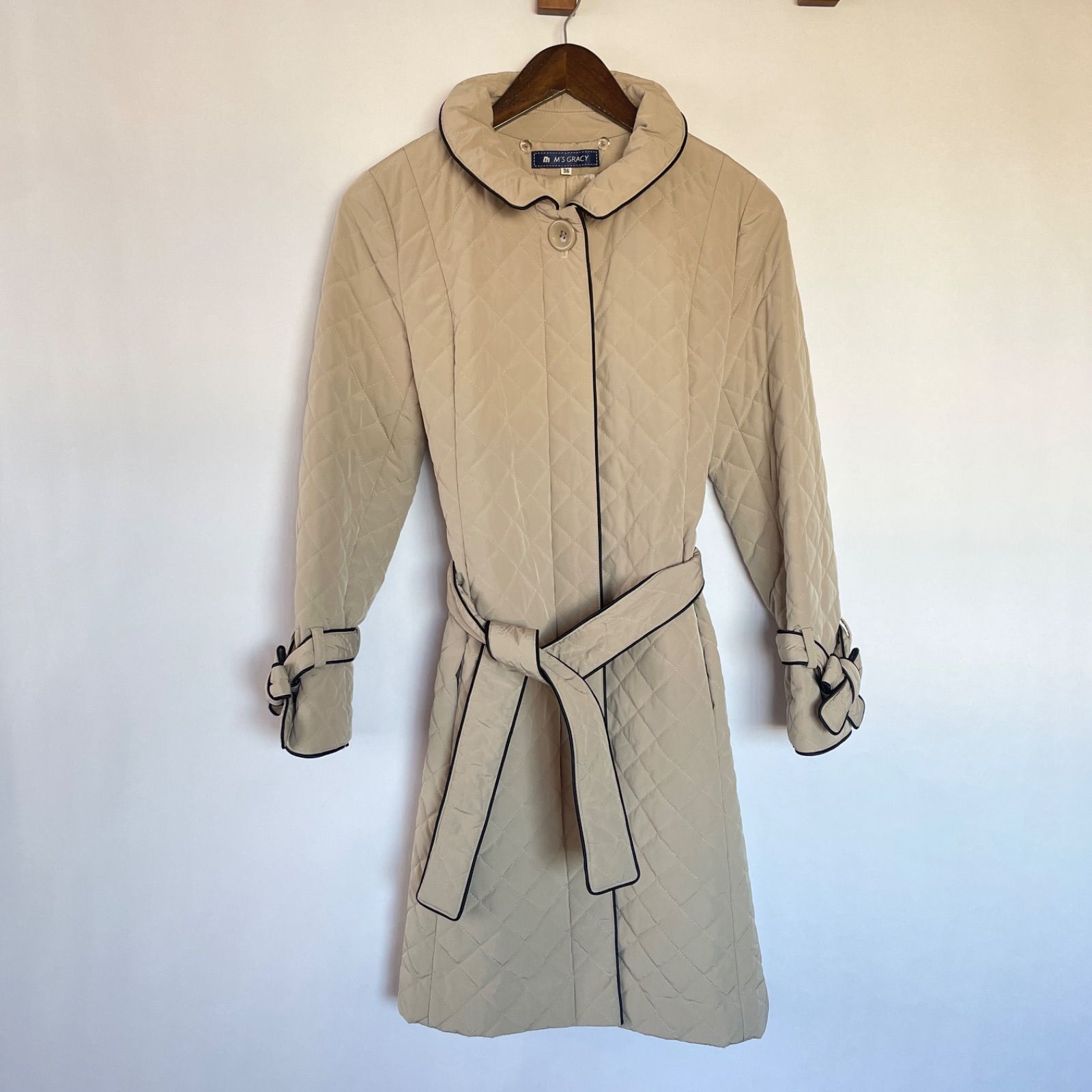 エムズグレイシー キルティングコート ロングコート 38 ベージュ リボン レーヨン混 ベルト トレンチコート