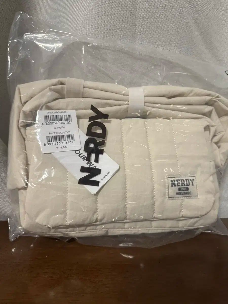 ノルディ ダウン クロスバック アイボリー