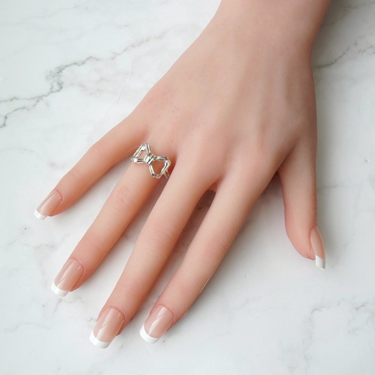 ティファニー リボン シルバー925 指輪 リング 10号 - メルカリ