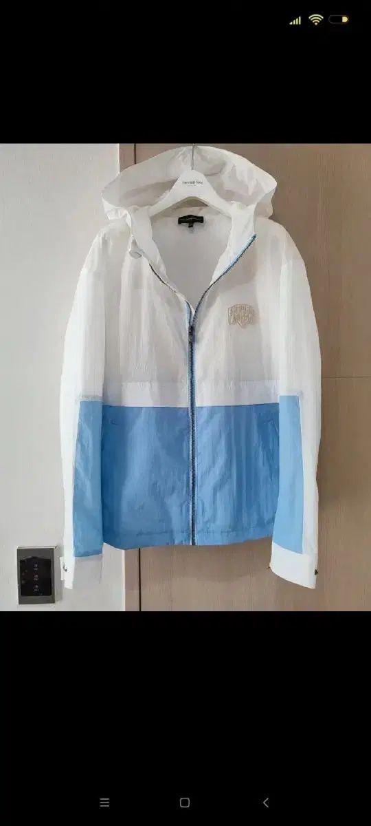 エンポリオ アルマーニ 白 ブルー ウィンドブレーカー レディース 66