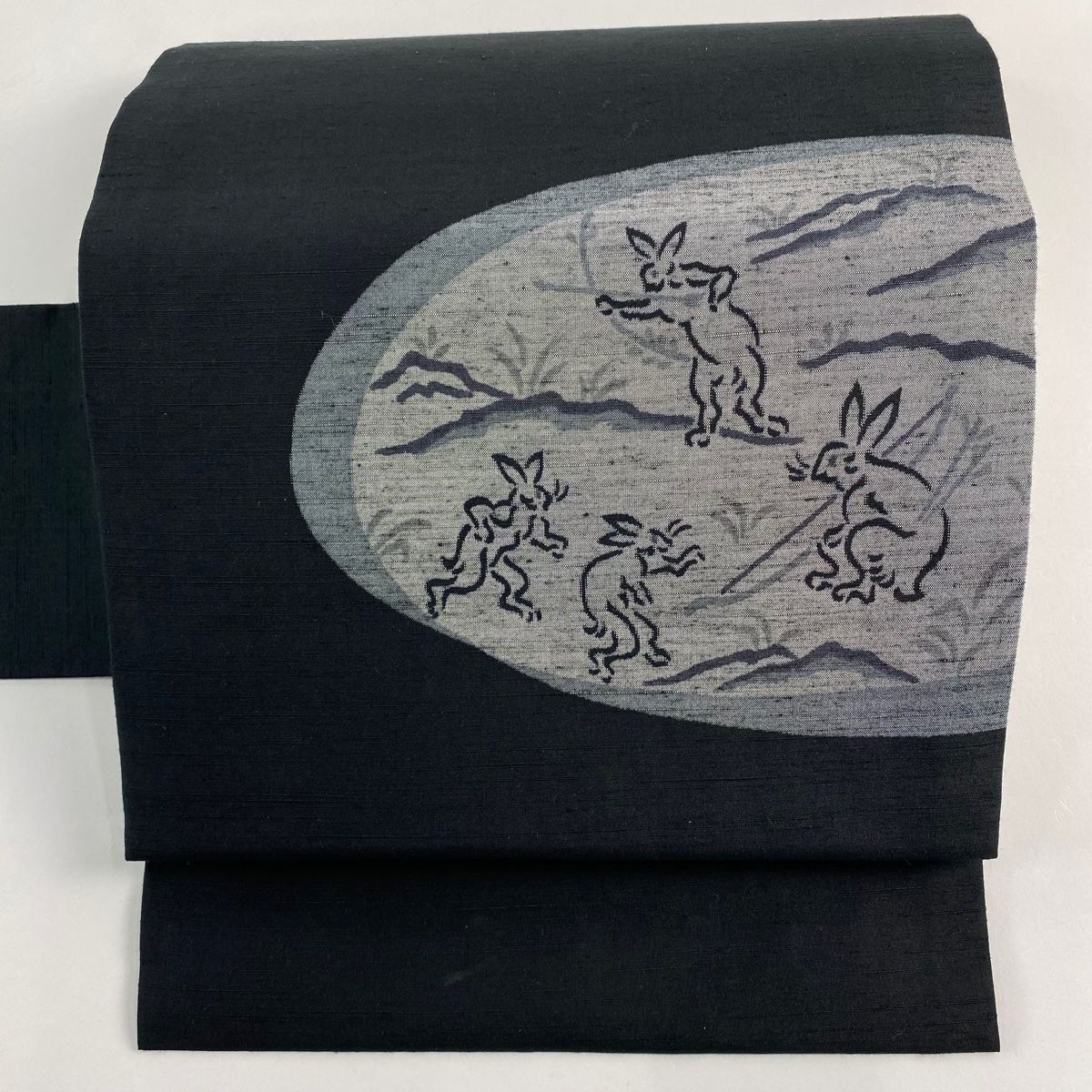 名古屋帯 紬地 鳥獣戯画 黒 正絹