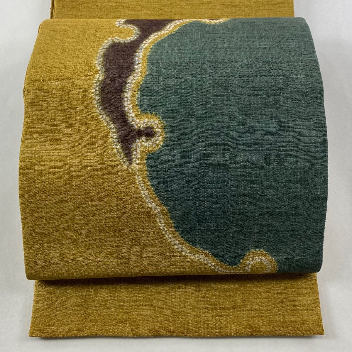 袋帯 紬地 雪輪 絞り 山吹茶色 お太鼓柄 正絹