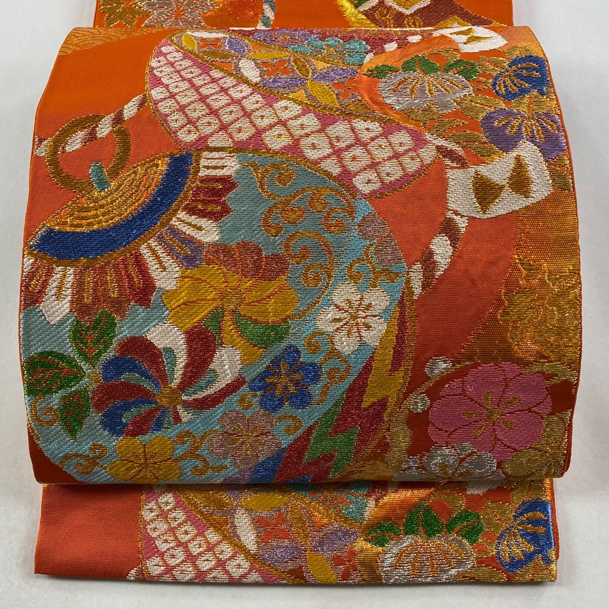 袋帯 落款 環美術織物 秀麗鈴熨斗文 箔 オレンジ 六通 正絹