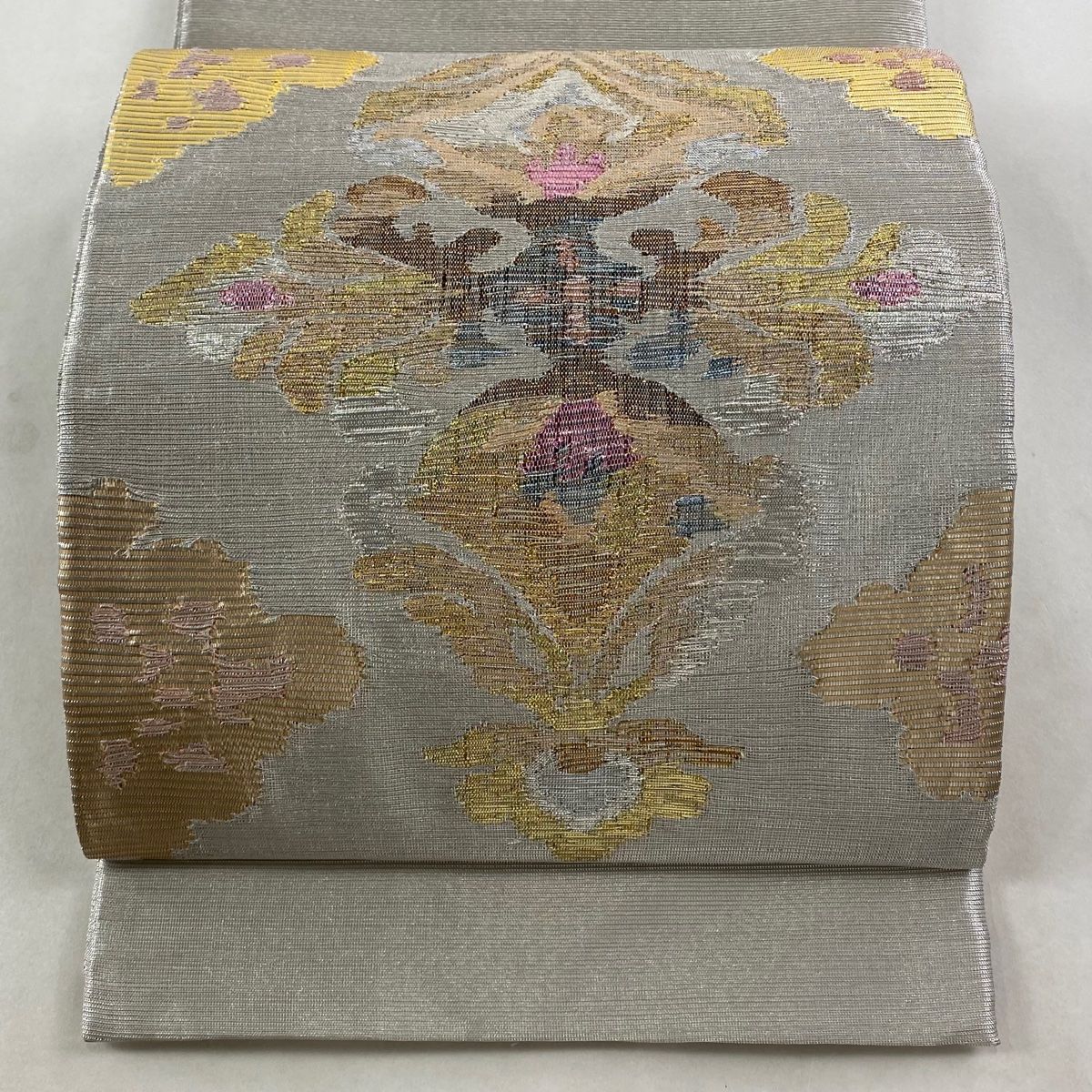 袋帯 秀品 落款 草花 箔 銀色 お太鼓柄 正絹