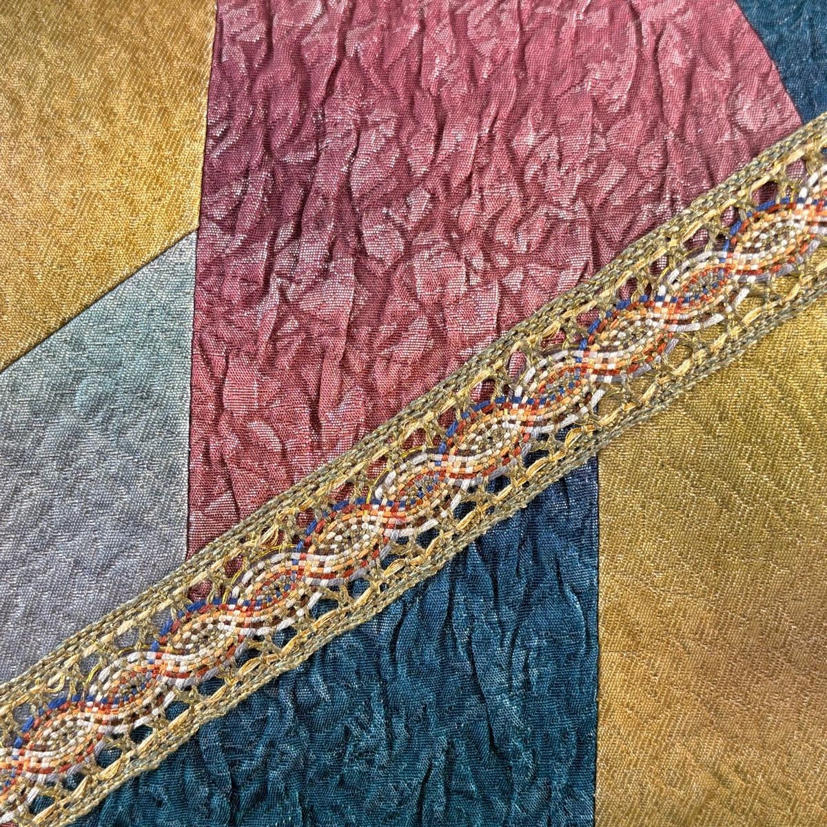 袋帯 秀品 幾何学 金糸 切り嵌め 黄土色 お太鼓柄 正絹