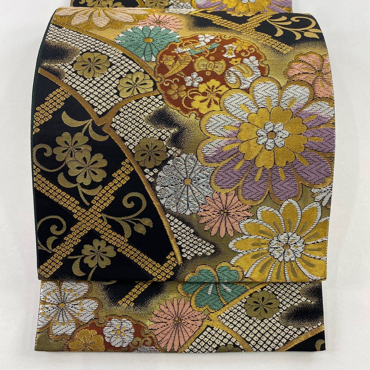 袋帯 秀品 花 雪輪 箔 金糸 黒 六通 正絹