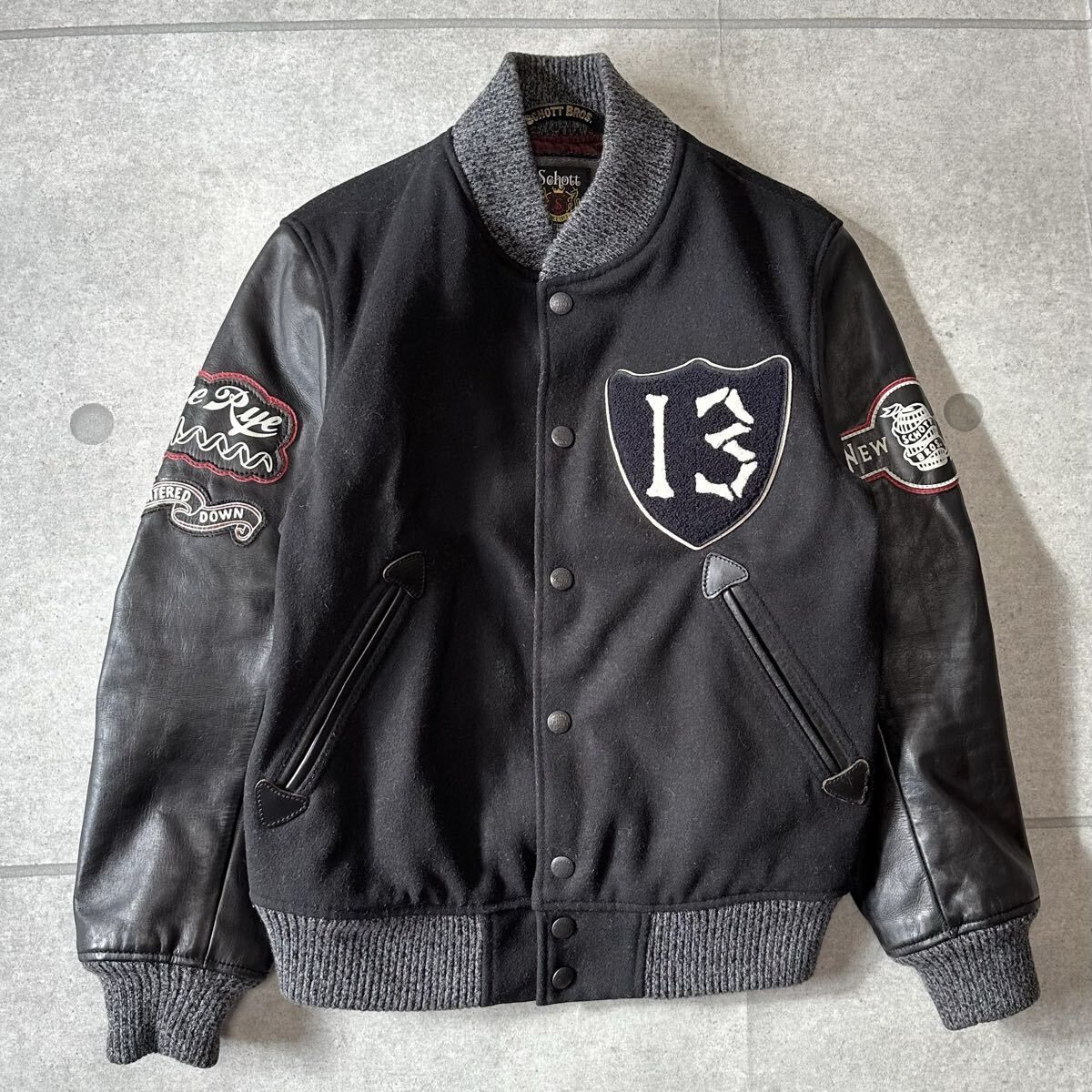 渾身の一着 SCHOTT ショット スタジャン 袖レザー切替 ワッペン ボタン刻印 牛革本革カウレザー上野商会 黒ブラック Mサイズ