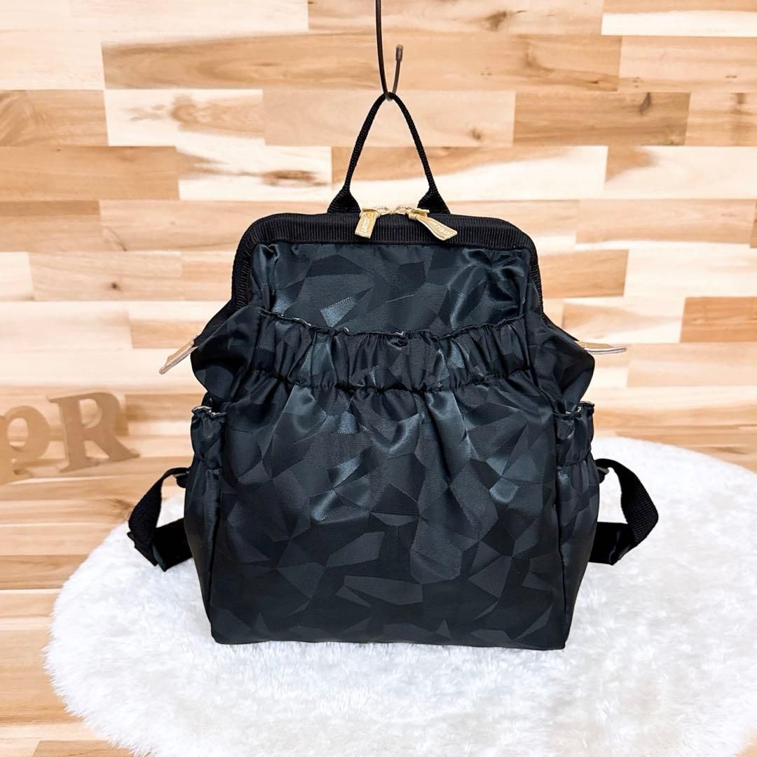 アルティザン-アーティスト ワイド オープン リュック ジャガード 黒×金 自立 バックパック