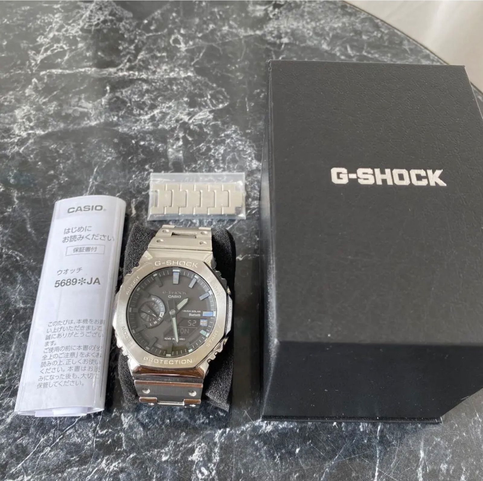 カシオ ソーラー 腕時計 G SHOCK GM B 2100 SD 1 AJF シルバー ブラック