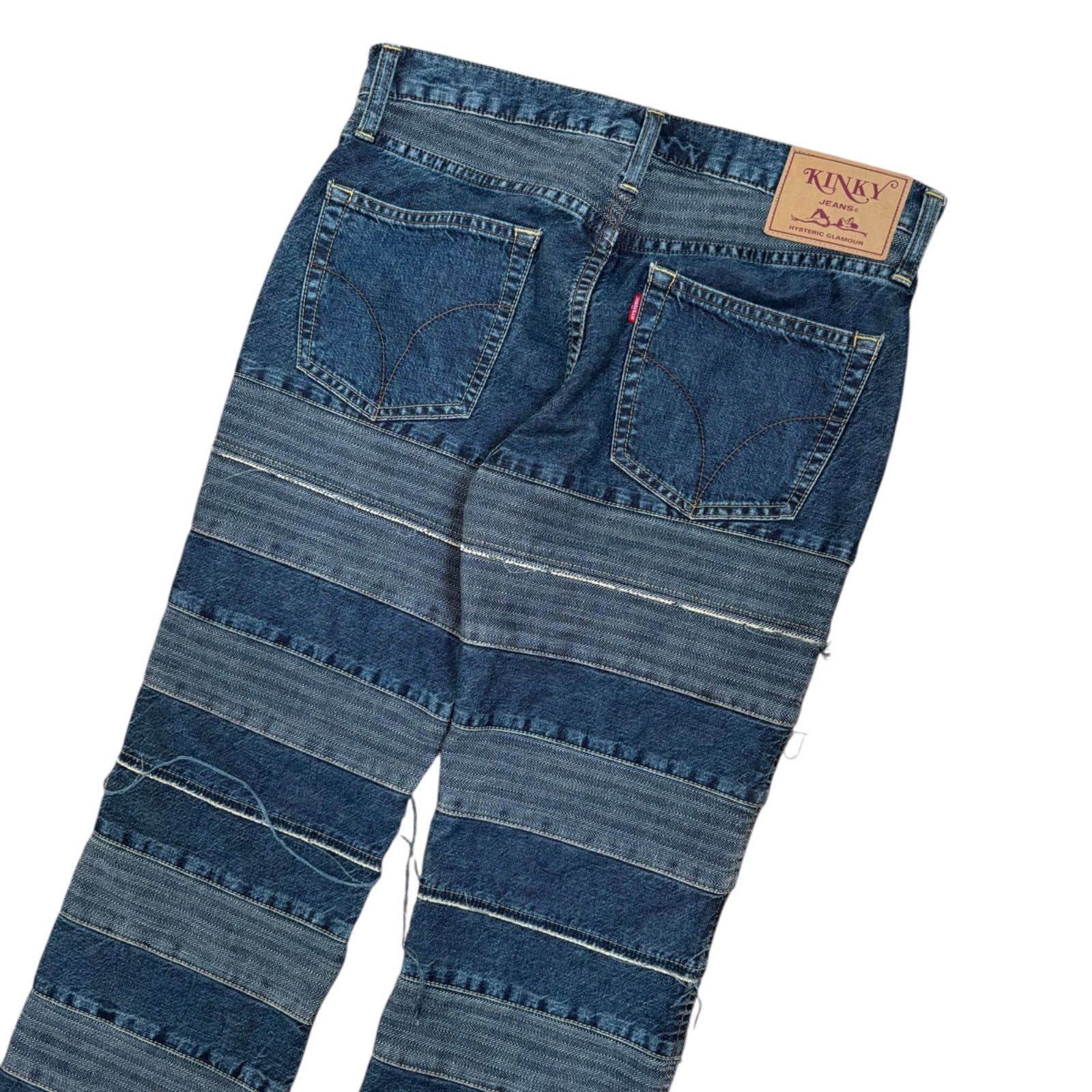 GLAMOUR ウミヘビ柄パッチワークブーツカットデニム