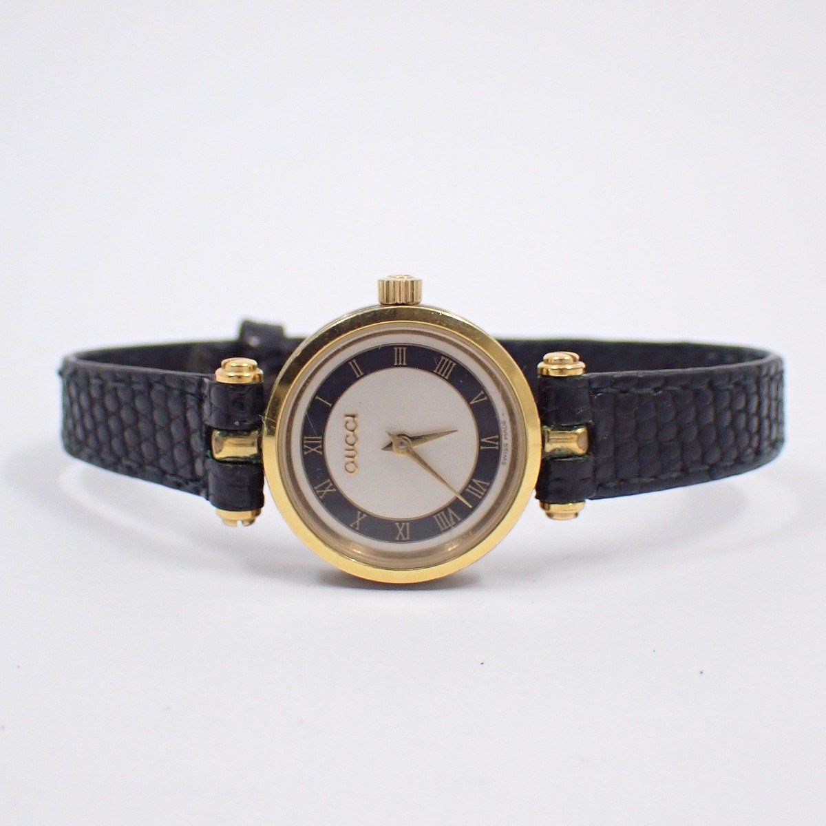 グッチ ラウンド型 ブラック×ゴールド クォーツ レディース 腕時計 白