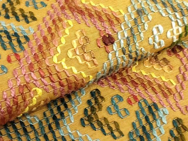 平和屋着物□極上 本場琉球 読谷山花織 紬地 九寸名古屋帯 櫨染色地