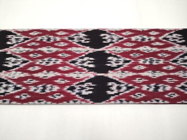 木綿 イカット柄 絣 全通 九寸名古屋帯 ボルドー味の赤×墨黒×ベージュ 極美品 貴久樹 インドネシアイカット 木綿 全通名古屋帯【お仕立て上がり