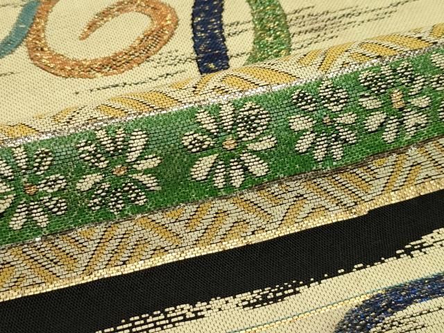 本袋帯 横段渦巻花文