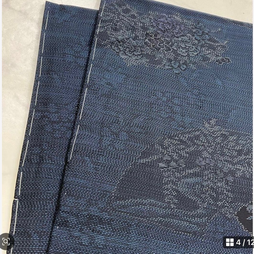 新品・未使用【大島紬】【袋帯】【証紙付き】 本場奄美大島紬 希少色 純泥染め 証紙付き 泥大島 正絹 唐草 葉柄 小紋