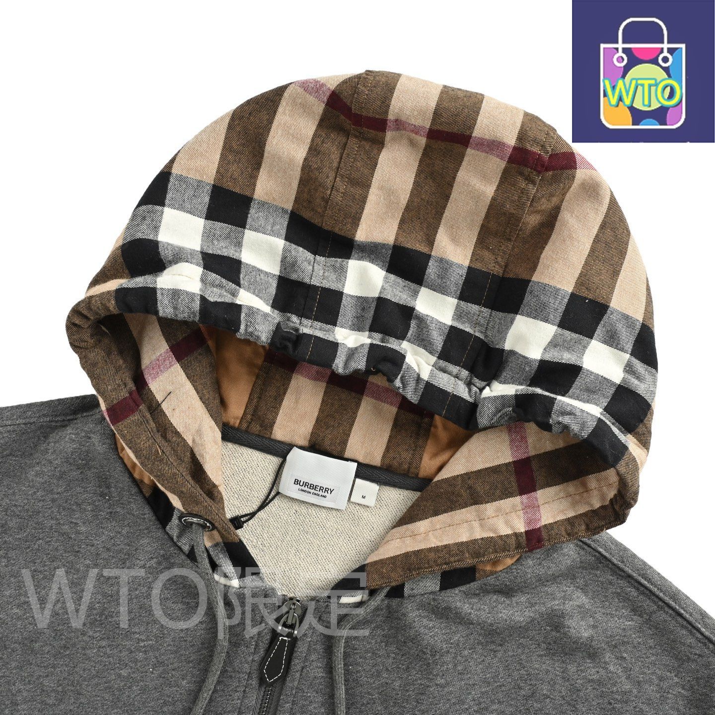 接ぎ目チェックフードジッパージャケット